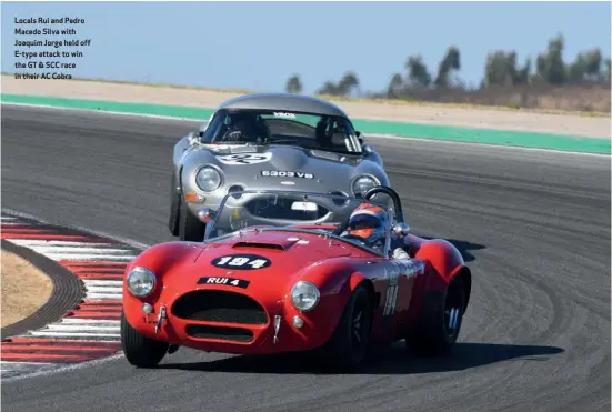  ??  ?? Locals Rui and Pedro Macedo Silva with Joaquim Jorge held off E-type attack to win the GT & SCC race in their AC Cobra