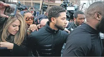  ?? Terrence Antonio James Chicago Tribune ?? JUSSIE SMOLLETT leaves Cook County Jail in Chicago after his release on a $100,000 bond. His legal team told the judge that the actor denies the “outrageous allegation­s” that he staged a hate crime against himself.