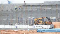  ?? PHOTOS BY JAMAR COACH/ JACKSON SUN ?? Constructi­on on the newly announced Amazon Last Mile Delivery Facility located off of Highway 223 and Lager Lane is underway in Jackson on Thursday.