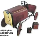  ??  ?? Early tinplate pedal car with miniature Shell oil cans reached £320.