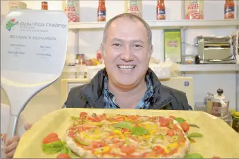  ?? PICTURE: ARMAND HOUGH ?? IT’S AMORE: Colin du Plessis, of The Lord’s Lodge in McGregor, won the South African leg of the Global Pizza Challenge, with his Mary Queen of Scots pizza. He heads to Melbourne next year for the finals.