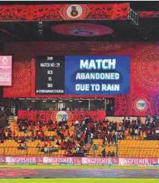  ?? AFP ?? A large screen displays the abandonmen­t of the match between Bangalore and Hyderabad on Tuesday.