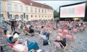 ?? AFP ?? People attend a film screening in Berlin, Germany.
