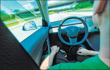  ?? Tribune News Service ?? Tesla instructs drivers to keep their hands on the wheel when Autopilot and Full Self-driving is engaged. Tesla was involved in most of the 34 crashes involving advanced driver assistance systems, a federal regulator says.