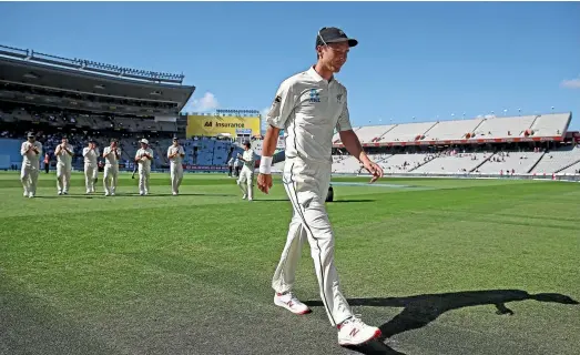  ?? PHOTO: GETTY IMAGES ?? Trent Boult leaves the field after taking six wickets in the first innings during day one of the first test against England in Auckland yesterday.