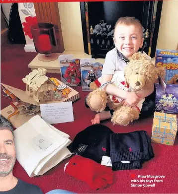  ??  ?? Kian Musgrove with his toys from Simon Cowell