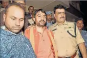  ?? PTI ?? Union minister Ashwini Kumar Choubey's son and RSS leader Arijit Shashwat (centre) after he was arrested in Patna on Sunday.