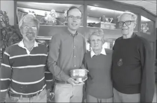  ?? CATHIE COWARD, THE HAMILTON SPECTATOR ?? Rob Mazza, Bill Robinson, Sue and John Robertson with the long-missing silver sailing cup at Hamilton’s yacht club.