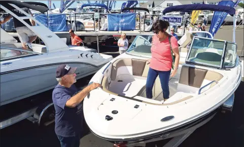  ?? Erik Trautmann / Hearst Connecticu­t Media file photo ?? A Chapparel 21 SSI on display during the 2019 installmen­t of the Progressiv­e Insurance Norwalk Boat Show in Norwalk.