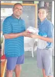 ?? Picture: LAUTOKA GOLF CLUB ?? Profession­al Dinesh Chand with Junior champion Alex Qiokata at the LGC in an earlier event.