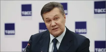  ?? AP PHOTO ?? In this file photo dated Nov. 25, 2016, Ukraine’s ousted president Viktor Yanukovych gestures as he speaks at a news conference in Rostov-on-Don, Russia. Ukrainian opposition lawmaker Serhiy Leshchenko, who helped uncover off-the-books payments to...