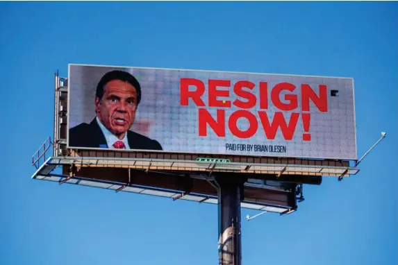  ?? (Getty) ?? A billboard urging the New York governor to step down