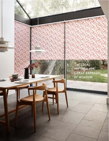  ??  ?? INGRID PUMPKIN THE ABSTRACT GEOMETRIC PATTERN of orange and pink circles and squares gives the Ingrid Pumpkin roller blind a dynamic style that makes a strong statement. The ideal pattern for large expanses of window