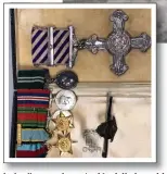  ?? ?? Hero...the DFC and bar, top, plus other medals awarded to Kenneth Wolstenhol­me in the Second World War