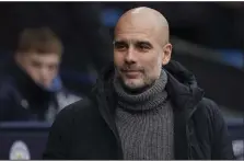  ?? (AP/Dave Thompson) ?? Manchester City Manager Pep Guardiola has plenty to worry about, not the least of which is defending the Premier League title and keeping his team’s season on track.