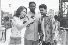  ??  ?? Violett Beane, as Cara, Brandon Micheal Hall, centre, as Miles, and Suraj Sharma, as Rakesh, star in God Friended Me, a new comedy that explores the intersecti­on of social media and spirituali­ty.