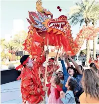  ?? Supplied photo ?? LOOK, A DRAGON: Last year’s grand parade saw over 34,000 residents celebrate Chinese culture. —