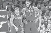  ?? Jason Miller / Getty Images ?? The Cavs’ experiment of playing Isaiah Thomas, left, alongside LeBron James ended after Thomas was traded to the Lakers.