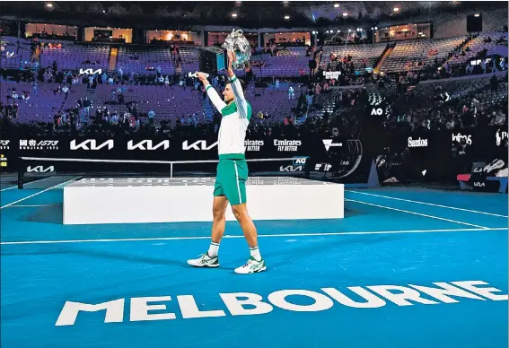  ??  ?? Serbia's Novak Djokovic beat Russia's Daniil Medvedev 7-5, 6-2, 6-2 in one hour and 53 minutes in the Australian Open final on Sunday. This is Djokovic’s 18th Grand Slam title.