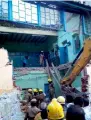  ?? PTI ?? Rescue workers clear the site of a bus stand roof collapse in Porayar of Nagapattin­am district on Friday. —