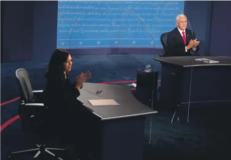  ?? AFP ?? US Vice President Mike Pence and Kamala Harris, a senator from California, face each other in a debate in Utah on Wednesday
