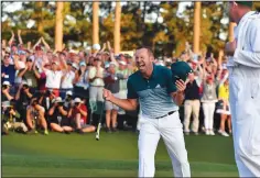  ?? BRANT SANDERLIN/TRIBUNE NEWS SERVICE ?? Sergio Garcia celebrates winning the green jacket following a one-hole playoff win against Justin Rose in the 81st Masters tournament on Sunday.