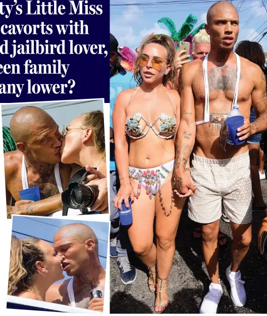  ??  ?? Caribbean canoodling: Chloe Green and Jeremy Meeks smooch in Barbados Crass act: Chloe, decked out in baubles, beads and a bikini, takes in the festival sights with her heavily tattooed ex-gangster boyfriend