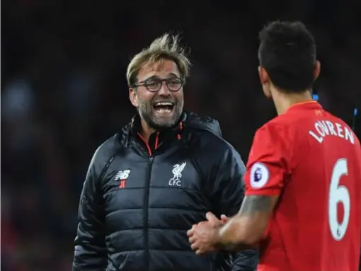  ??  ?? Jurgen Klopp celebrates with Dejan Lovren after Liverpool's 2-1 win over West Brom (Getty)