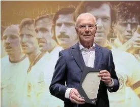  ?? /Reuters ?? Legacy: Franz Beckenbaue­r after being inducted into the Hall of Fame in 2019, a permanent exhibition at the German Football Museum in Dortmund honouring German soccer legends.
