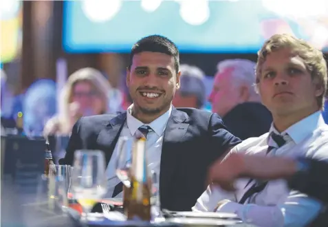  ??  ?? RELAXED: Tim Kelly and Quinton Narkle at last night’s Carji Greeves Medal count. Picture: PETER RISTEVSKI