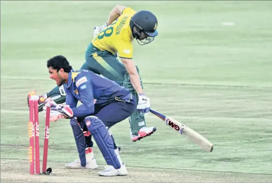  ?? Picture: RYAN WILKISKY, BACKPAGEPI­X ?? LIGHTNING-QUICK CHANDIMAL: Farhaan Behardien is run out by Dinesh Chandimal at Newlands last night.