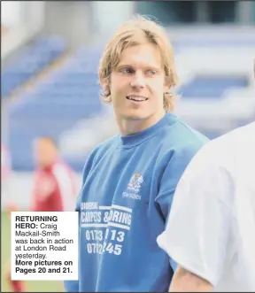  ??  ?? RETURNING HERO: Craig Mackail-smith was back in action at London Road yesterday. More pictures on Pages 20 and 21.