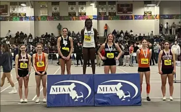  ?? COURTESY PHOTO ?? Billerica’s Nyrah Joseph stands atop the podium at the Reggie Lewis Center after winning the girls 55-meter hurdles race.