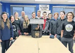  ?? CONTRIBUTE­D ?? Students at South Colchester Academy built a small well that could be moved to several locations to represent the work being done by the Water of Life project. Several partners used it during fundraisin­g events.