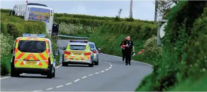  ?? Picture: Martin Caveney ?? Emergency services at the scene of the crash on Monday.