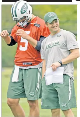  ?? Bill Kostroun ?? NEXT MAN UP: Quarterbac­ks coach Jeremy Bates (right), working with Christian Hackenberg, is expected to be named the Jets sixth offensive coordinato­r in the past eight seasons.