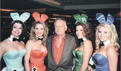  ?? Picture: EPA ?? CONSUMMATE PLAYBOY. Hugh Hefner poses with Playboy bunnies at the Hard Rock Hotel in Las Vegas, Nevada, in 2001. Hefner died of natural causes at the age of 91 at his Los Angeles home, the Playboy Mansion.