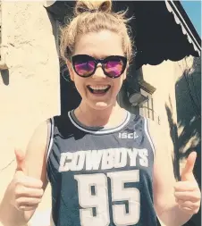  ?? Actress Harriet Dyer gives the Cowboys a big thumbs up. ??