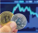  ?? — AFP ?? Bitcoin surging due to growing investor demand amid speculatio­n over when the United States may begin lowering interest - / .Ǧ