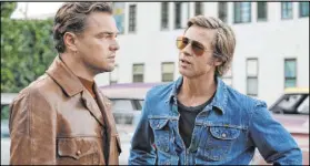  ?? Andrew Cooper Sony Pictures ?? Leonardo DiCaprio, left, and Brad Pitt star in Quentin Tarantino’s nostalgic “Once Upon a Time … in Hollywood.”