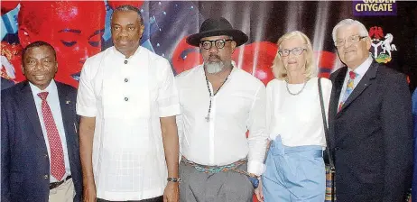  ??  ?? Dr. Isaac Thompson Amos, Chairman/ceo of Thompson and Grace Investment Limited, Lagos; Mr. Udom Inoyo, Vice Chairman, Mobil Producing Nigeria Unltd, Lagos; Mr. Wilfred Ukpong, Artist, Film maker and producer of the “Future World” film, which won the...