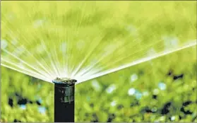  ?? DREAMSTIME ?? Newer, smart irrigation systems account for seasonal adjustment­s and weather.