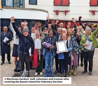  ?? ?? Martineau Gardens’ staff, volunteers and trustees after receiving the Queen’s Award for Voluntary Services