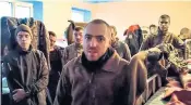  ?? ?? Ukrainian servicemen in a penal colony in Olyonivka, eastern Ukraine, yesterday, under the control of the Donetsk People’s Republic, after leaving the Azovstal steel plant in Mariupol, according to the Russian Defence Ministry