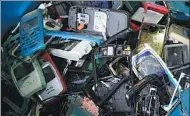  ?? NG SOR LUAN / THE STRAITS TIMES ?? Households in Singapore produce about 30,000 tons of e-waste a year.