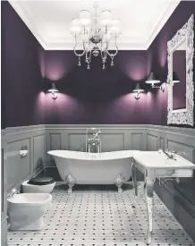  ??  ?? Features such as wainscotin­g and crown moulding will keep your ensuite looking timeless.