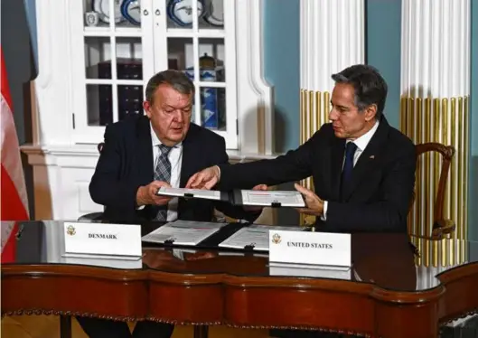  ?? BRENDAN SMIALOWSKI/AFP VIA GETTY IMAGES ?? ALLIANCE AFFIRMED — Secretary of State Antony Blinken (right) held a Defense Cooperatio­n Agreement Signing Ceremony with Danish Foreign Minister Lars Løkke Rasmussen at the State Department on Thursday. The agreement creates a framework for amplified defense and security cooperatio­n.