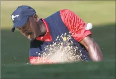  ?? David Paul Morris / Special To The Chronicle ?? Michael Jordan hits out of the sand trap on the 16th hole at Harding Park Golf Course in San Francisco in 2009.