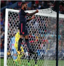  ?? Getty Images ?? Alexandre Lacazette came off the bench to score for Arsenal against hosts Sydney at the ANZ Stadium