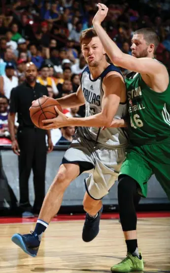  ?? GARRETT ELLWOOD/GETTY IMAGES ?? Steven Spieth, left, made an impression while with his hometown Dallas Mavericks in the NBA Summer League.